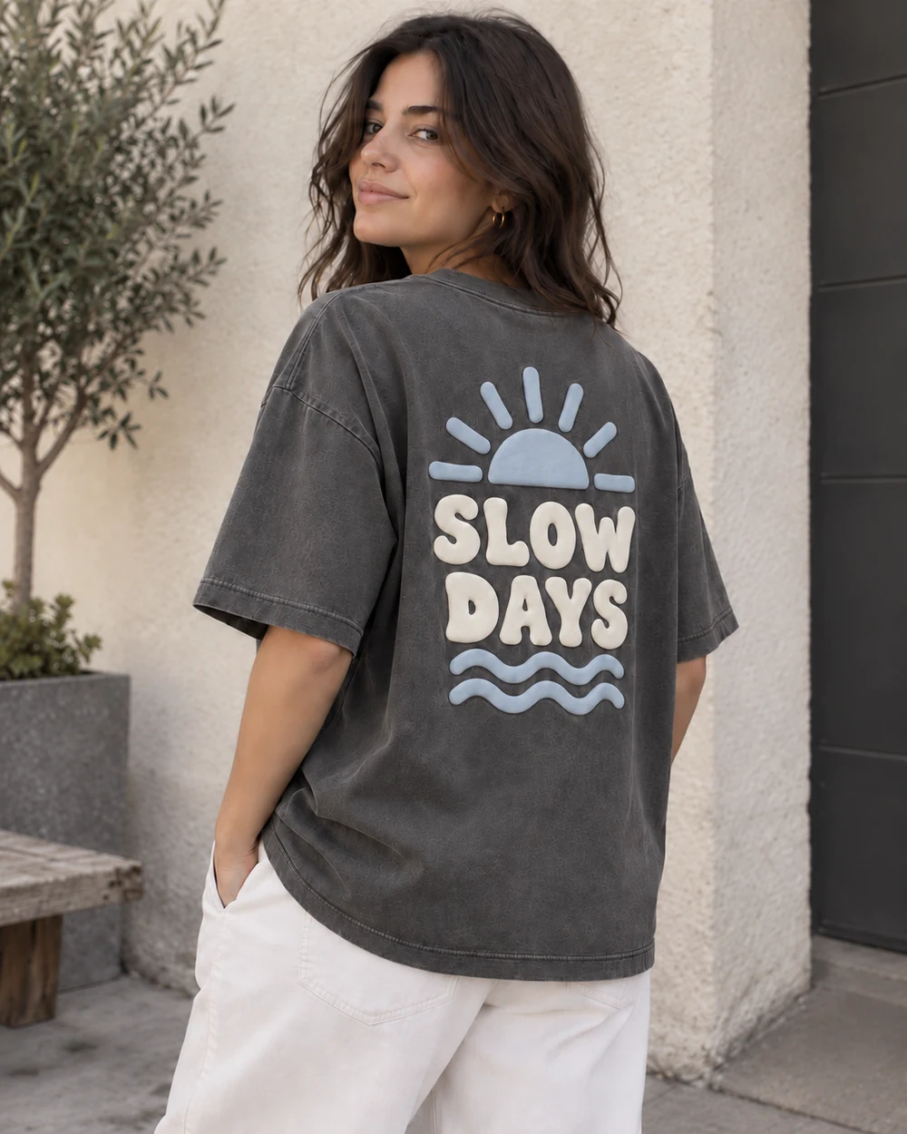 Back view of custom puff print T-shirt with raised two-color graphic